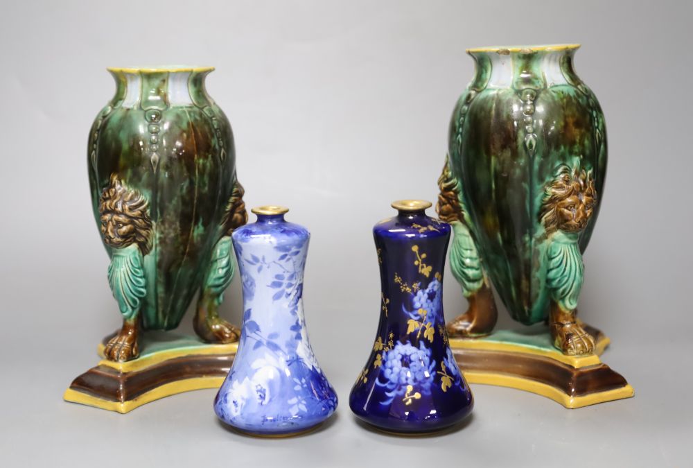 A pair of Victorian majolica vases, height 16cm and two Doulton Burslem Corolian ware miniature vases, height 11cm